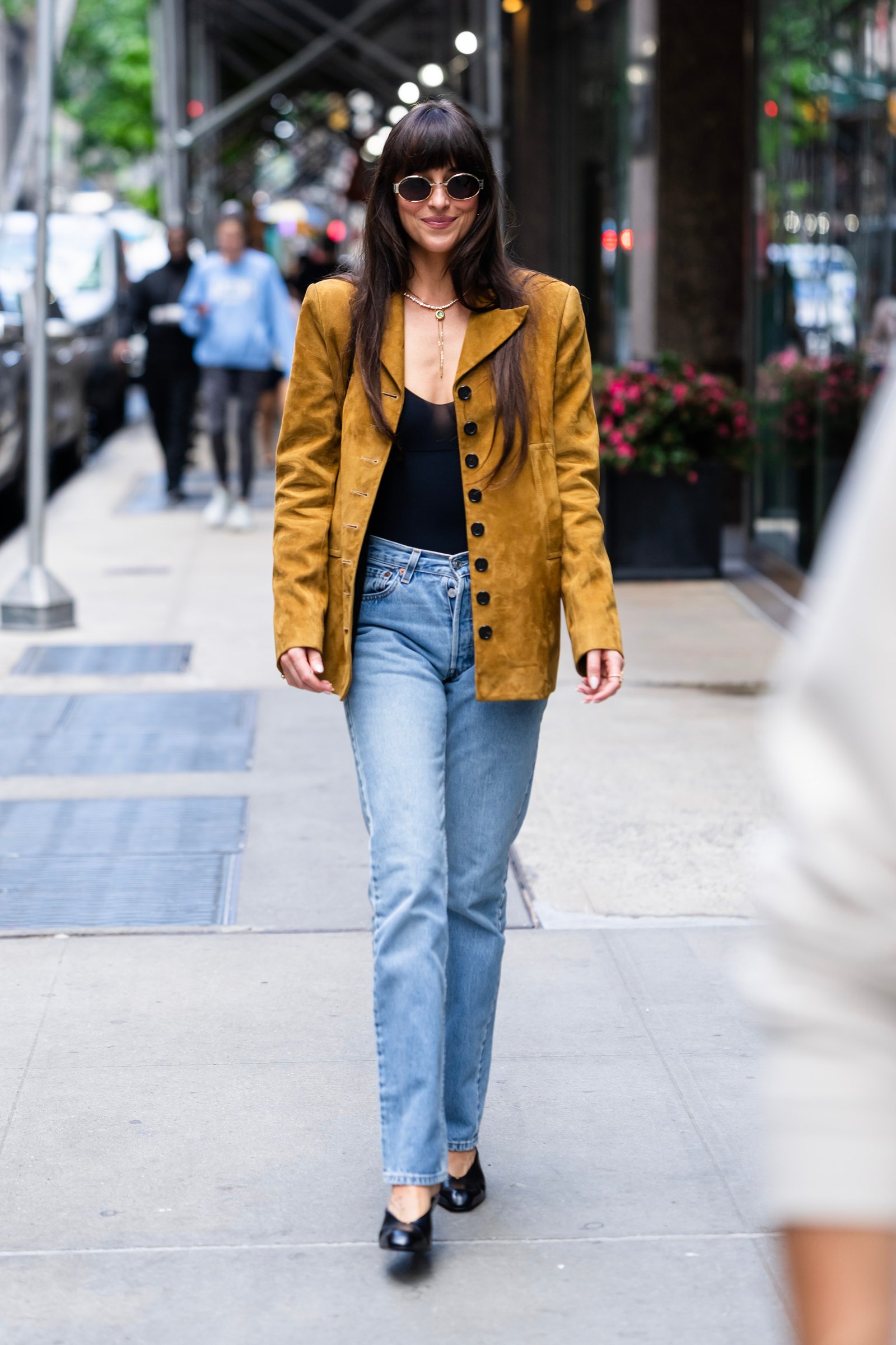 NEW YORK, NEW YORK - MAY 30: Dakota Johnson is seen in Midtown on May 30, 2025 in New York City.
