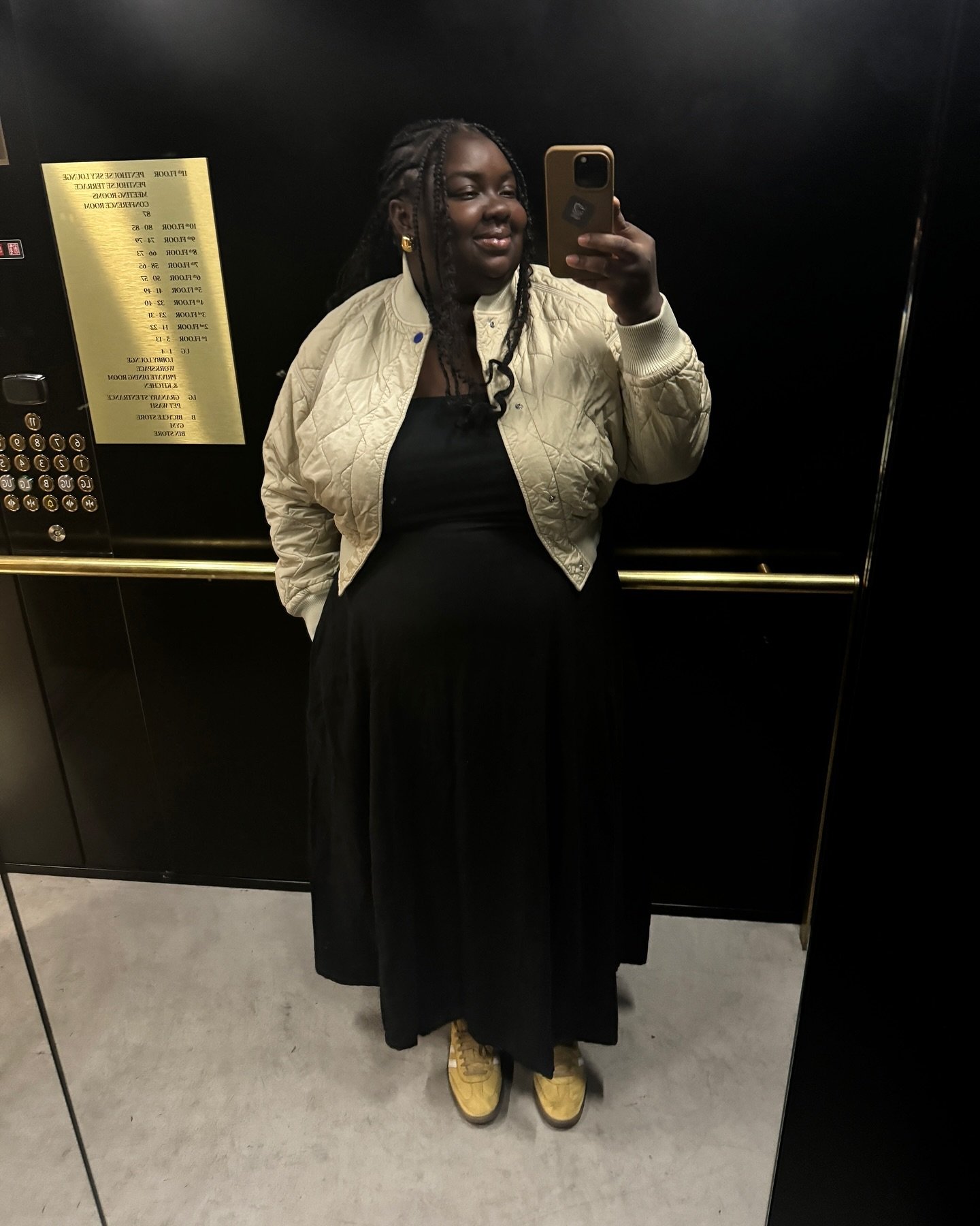 Influencer wears butter yellow trainers.
