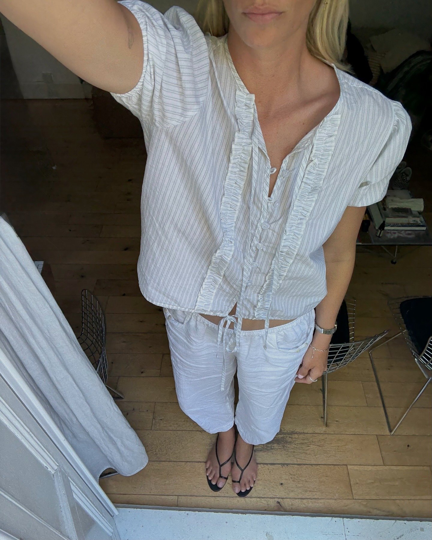 Woman wears pretty summer blouse