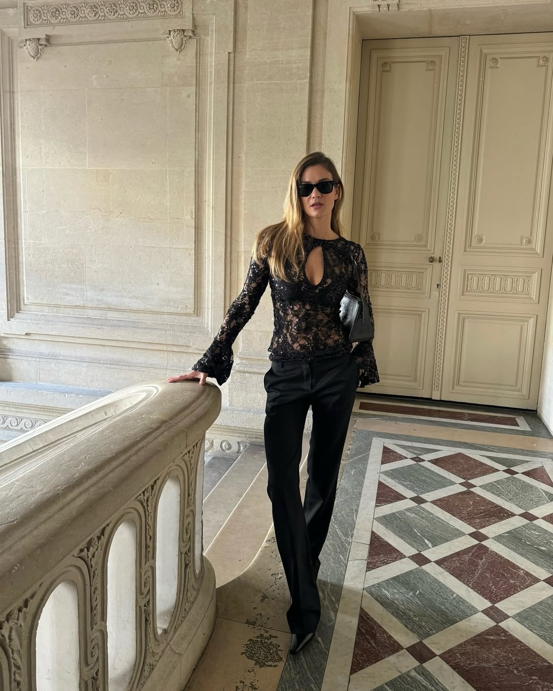 Anne-Laure Mais wearing skinny pants and point-toe ankle boots