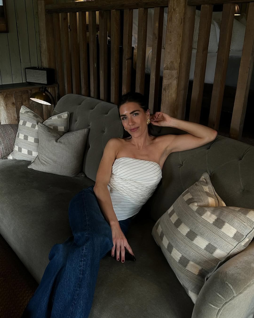 fashion influencer in stripey bandeau and jeans