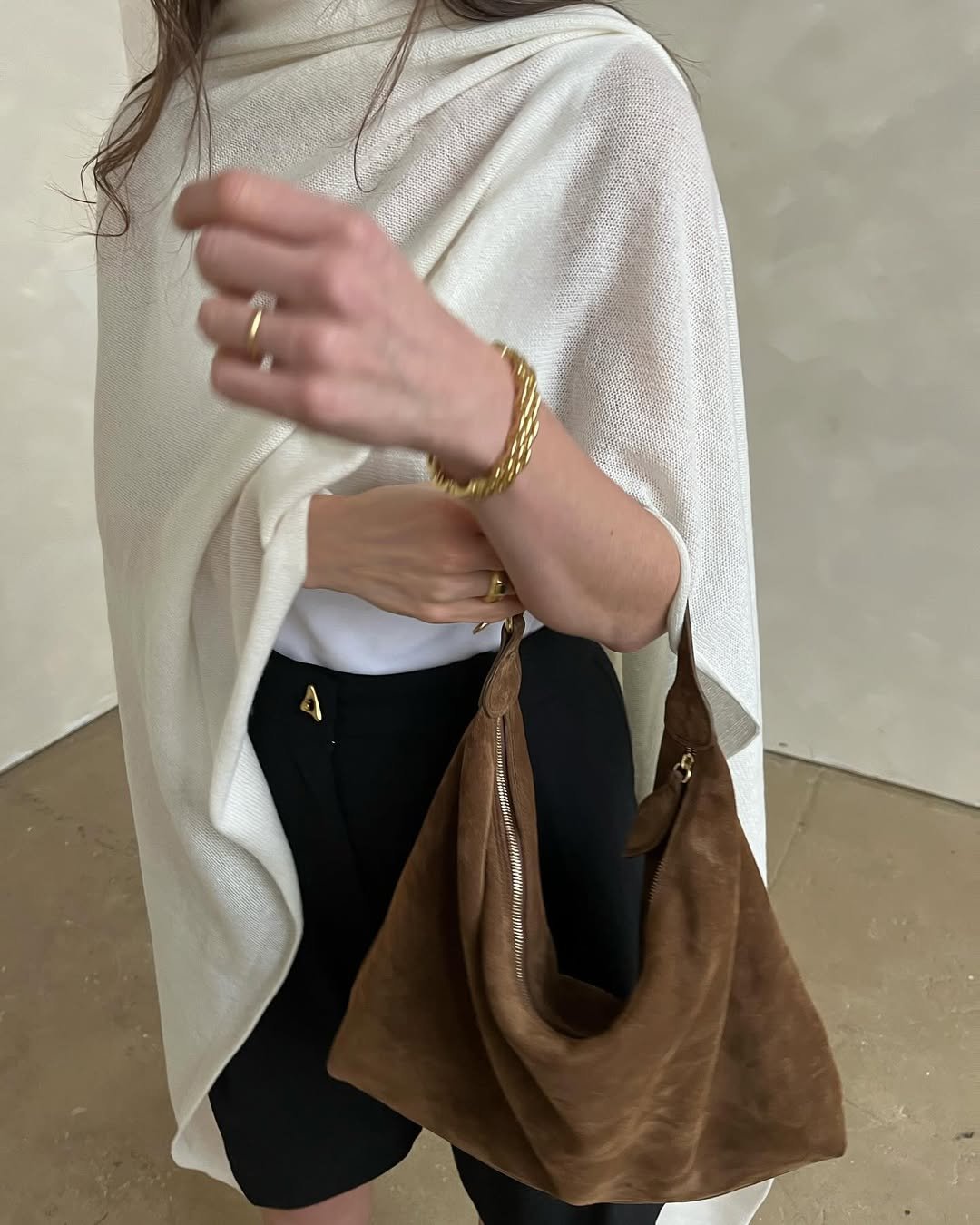 Laura Reilly wearing a poncho.