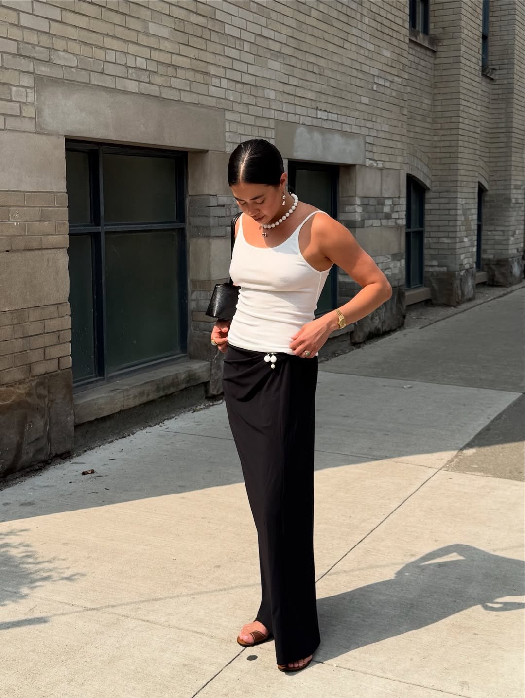 Sasha wearing vest top