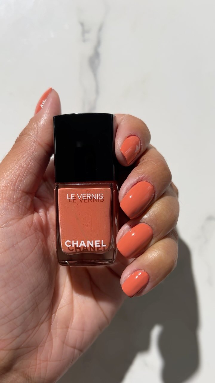 Coral orange Chanel nail polish