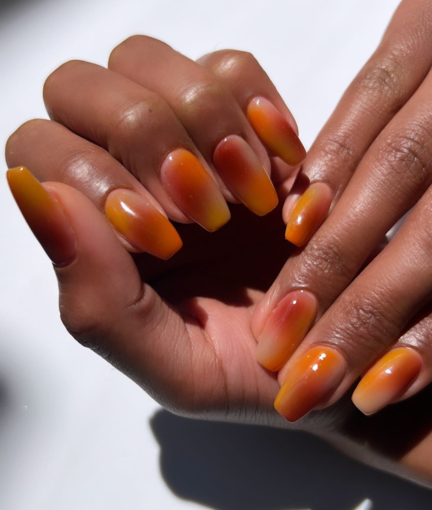 Orange watercolour nails