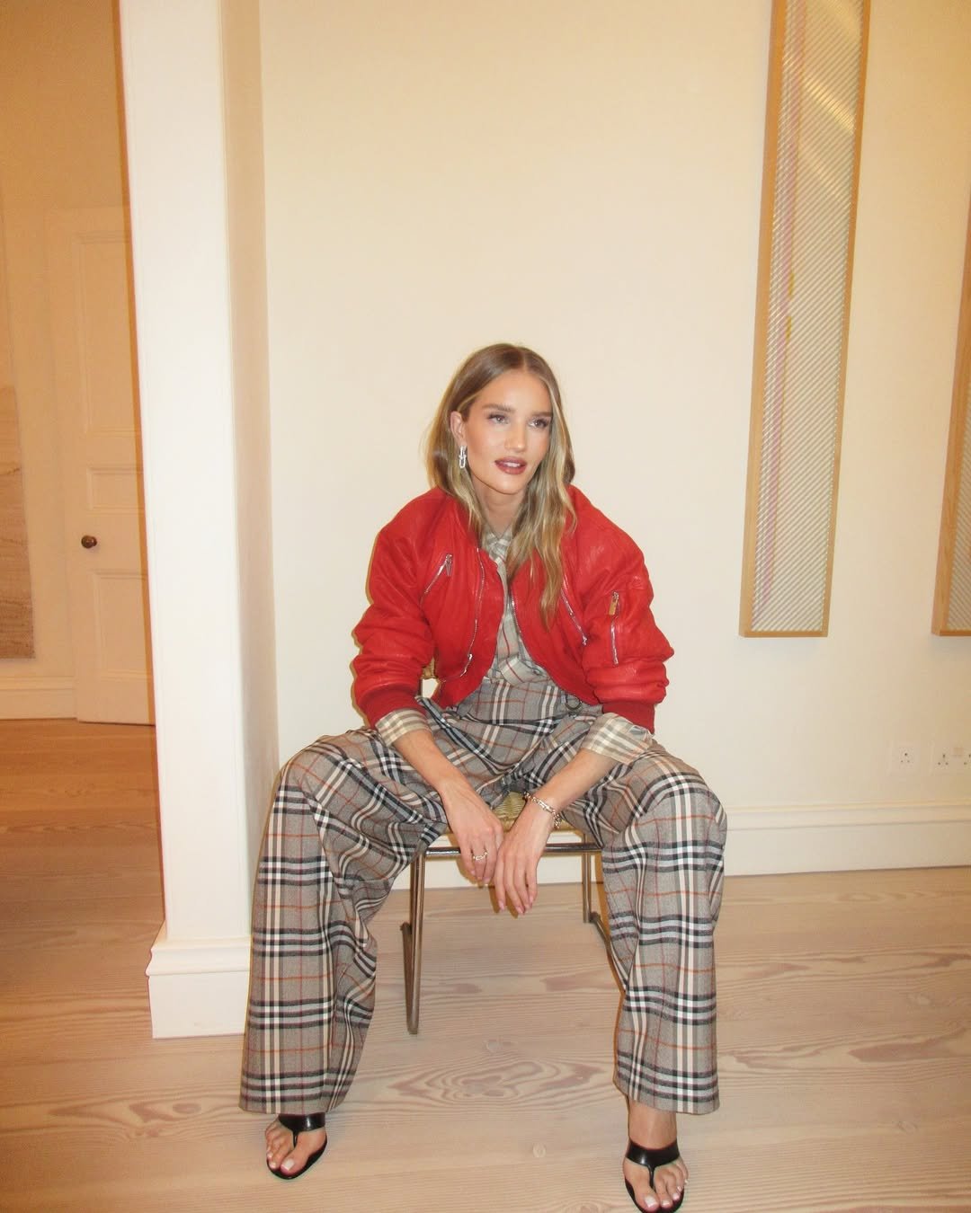Rosie HW wearing heeled flip-flops