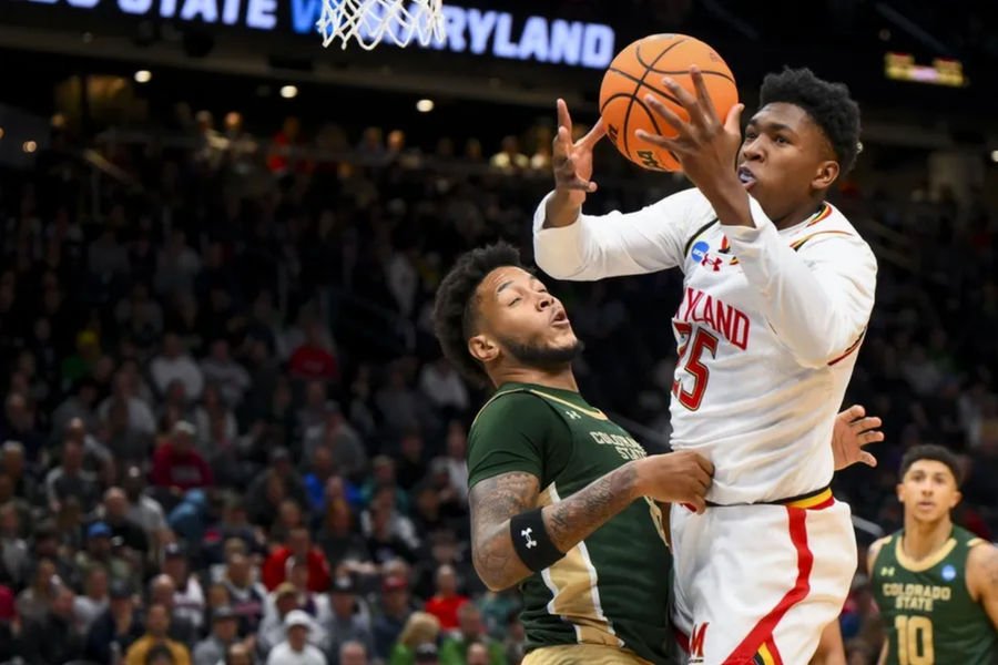 Mar 23, 2025; Seattle, WA, USA; Maryland Terrapins center Derik Queen (25) drives to the basket against Colorado State Rams forward Jaylen Crocker-Johnson (8) in the first half at Climate Pledge Arena. Mandatory Credit: Steven Bisig-Imagn Images
