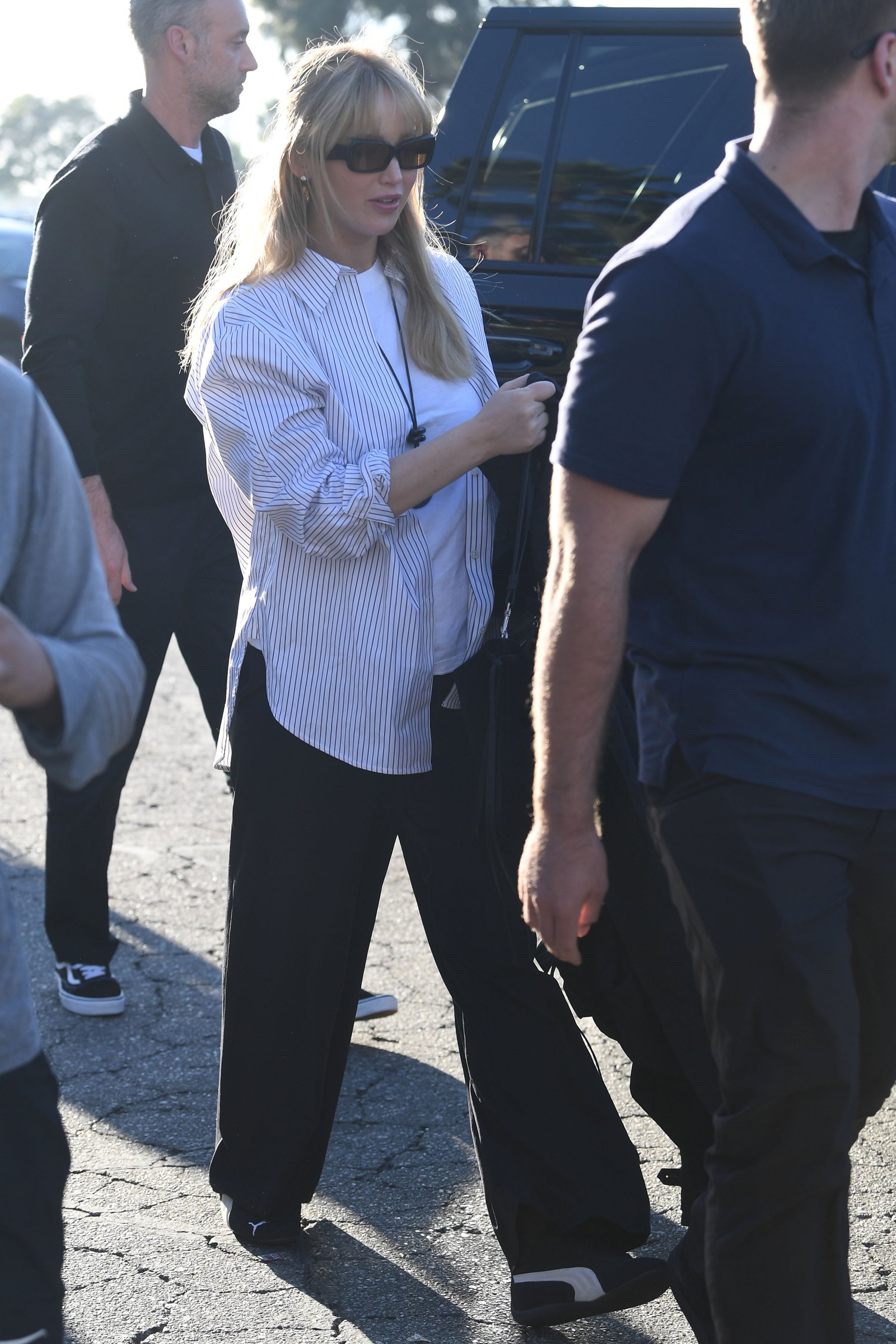 Jennifer Lawrence wears a Puma Speedcat OG trainers outfit.