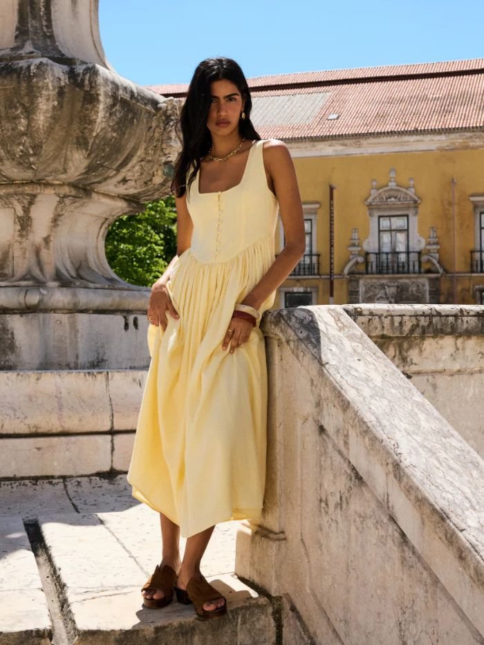 woman wearing yellow dress