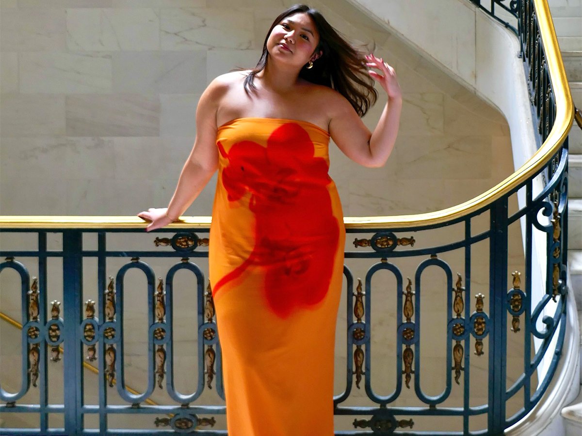 Influencer Marina Torres wearing a Meshki floral dress.