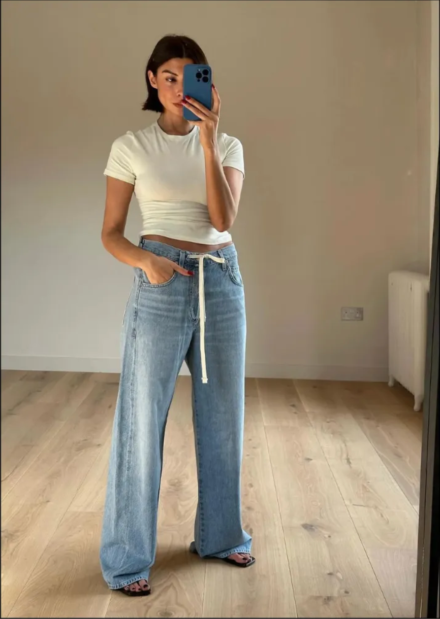 Fashion person Marinna wears the drawstring jean trend in a recent image from her Instagram.