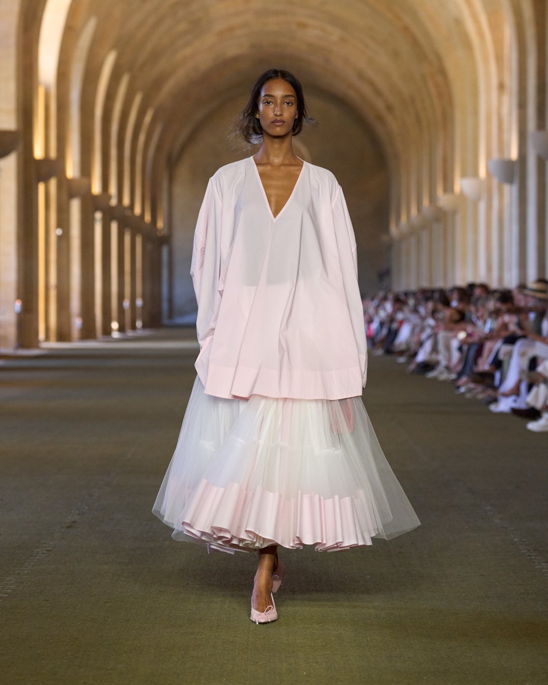 A woman walks the jacquemus show