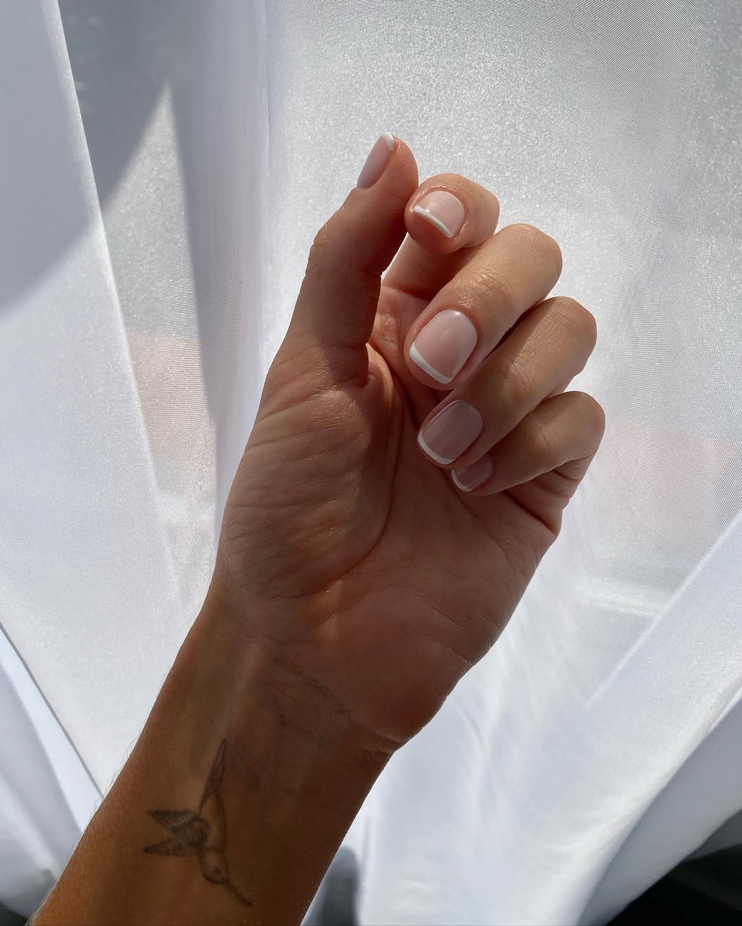 Chic French tip design on short nails