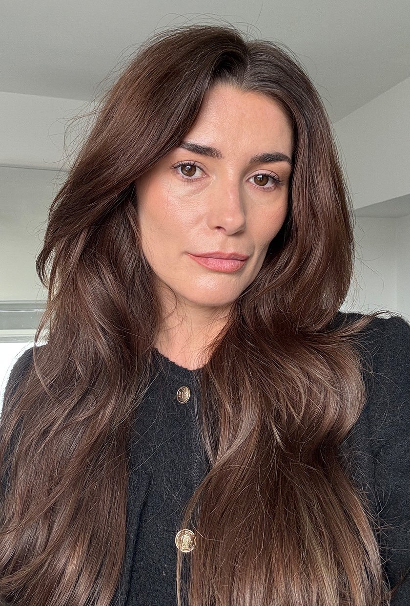 Eleanor's hair with a cool toned brunette hair colour before trying raffia blonde balayage