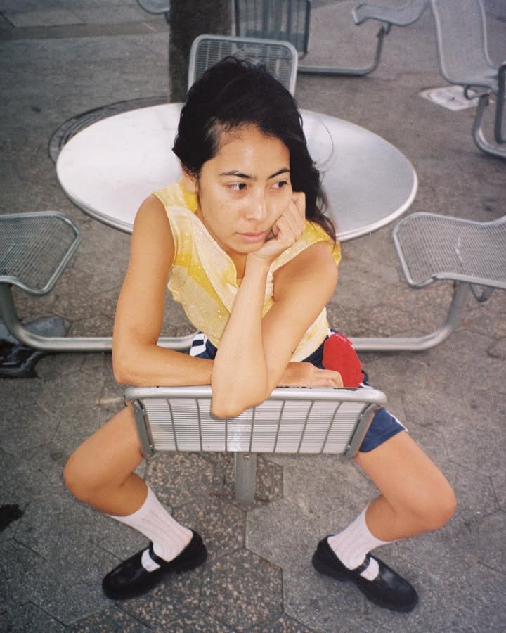 An image of @himichelleli wearing Mary Jane sneakers.