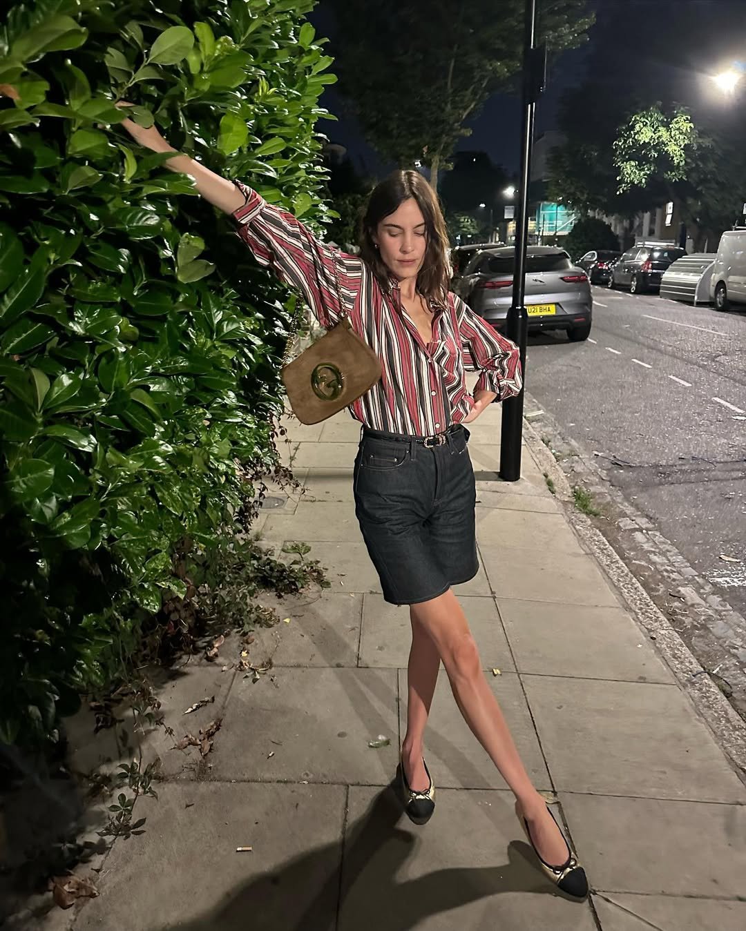 Alexa Chung wearing ballet flats with shorts