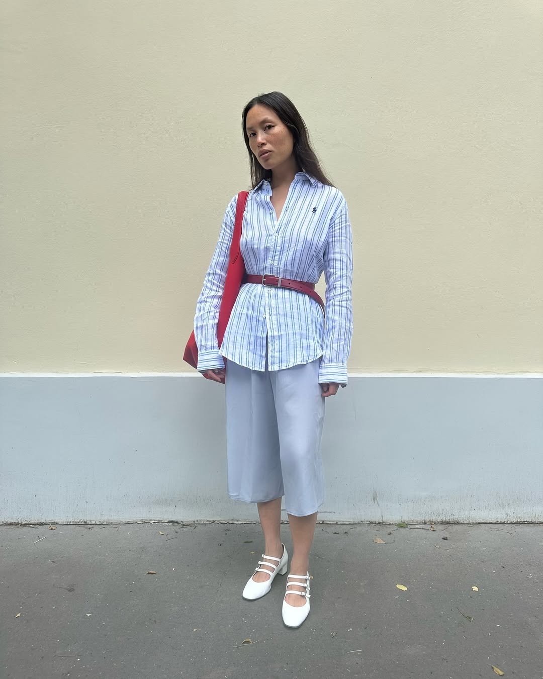 Viki in white Mary Jane pumps and culottes