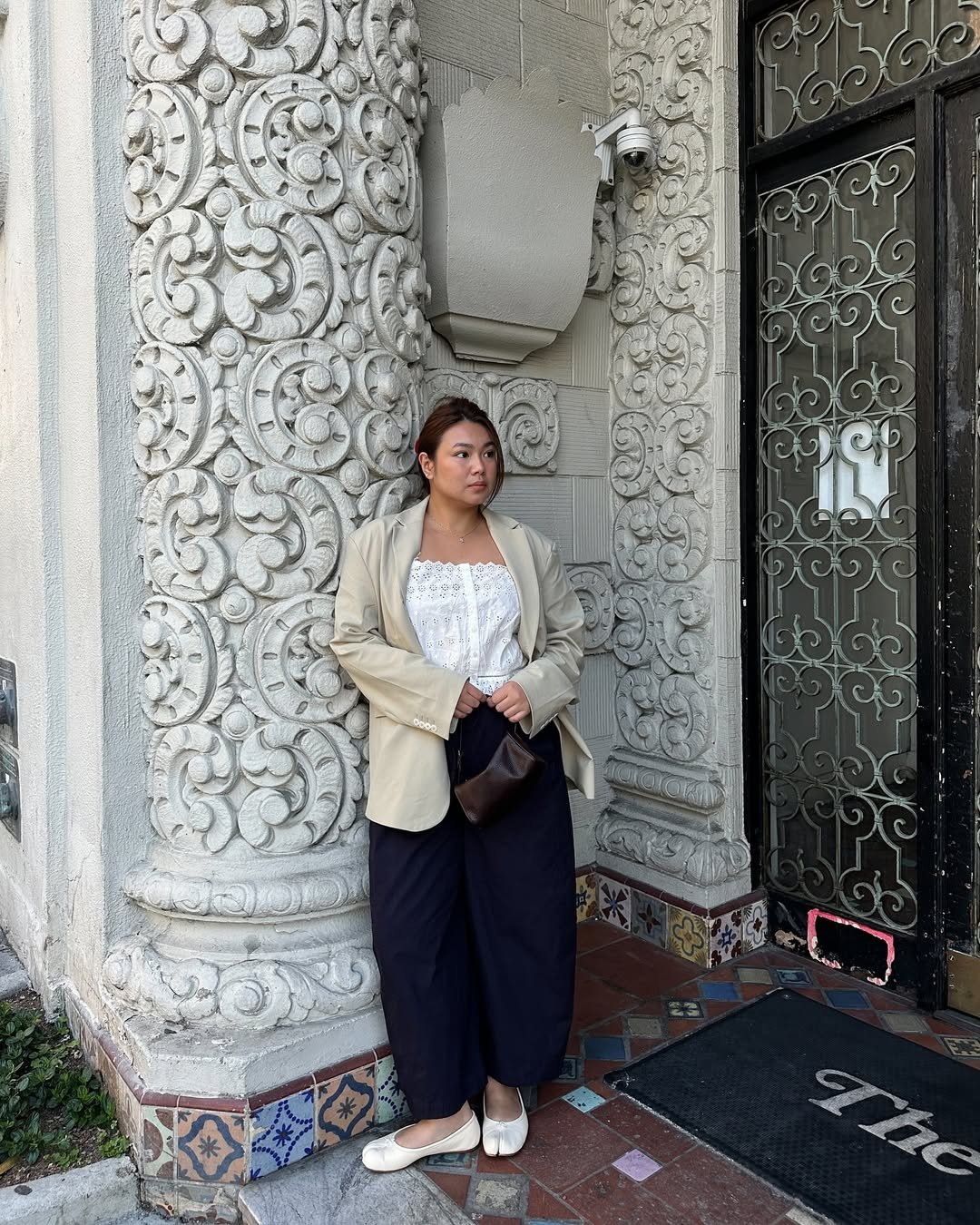 Marina in white Tabi flats and culottes