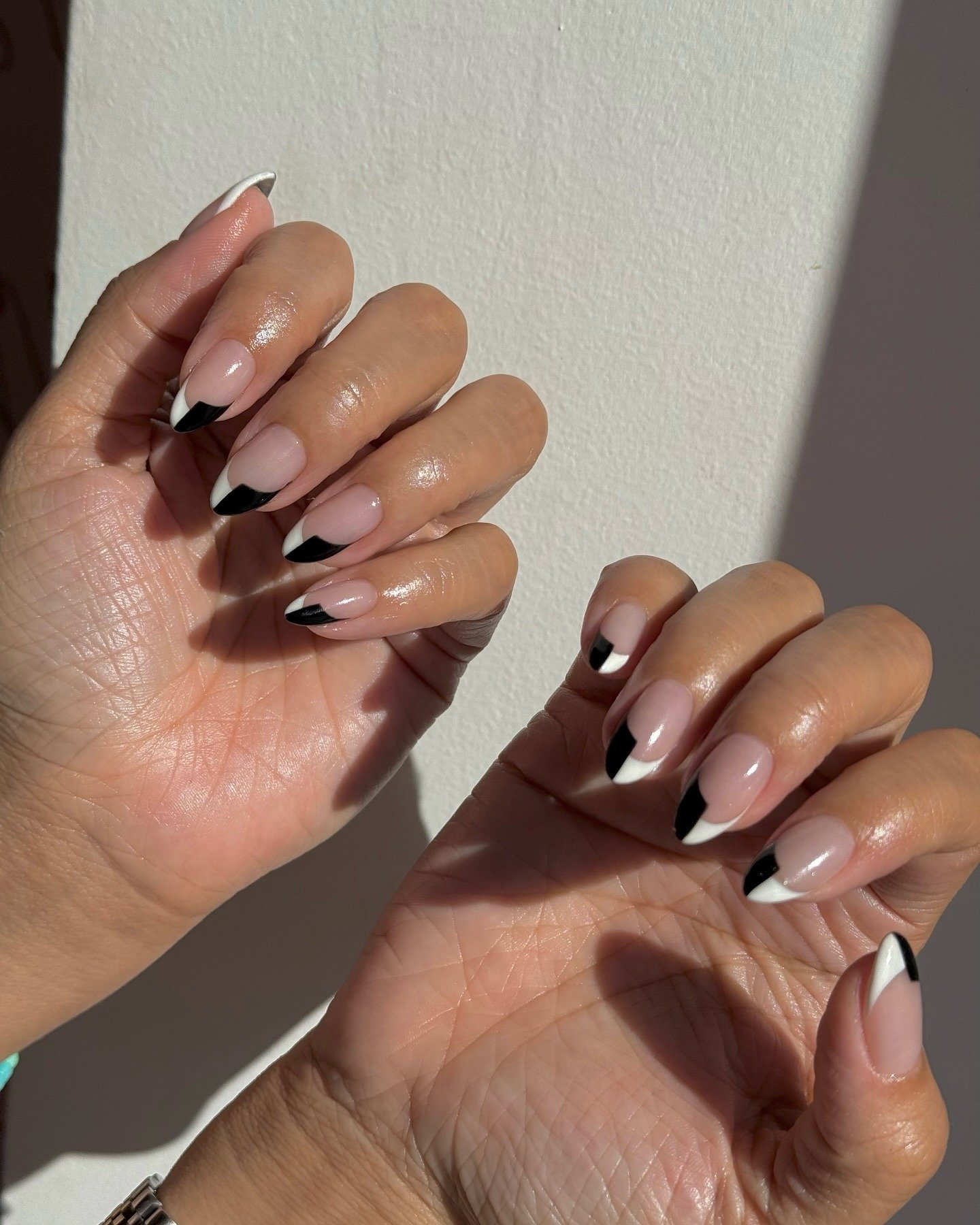 Photo of @nailartbyqueenie wearing tuxedo nails
