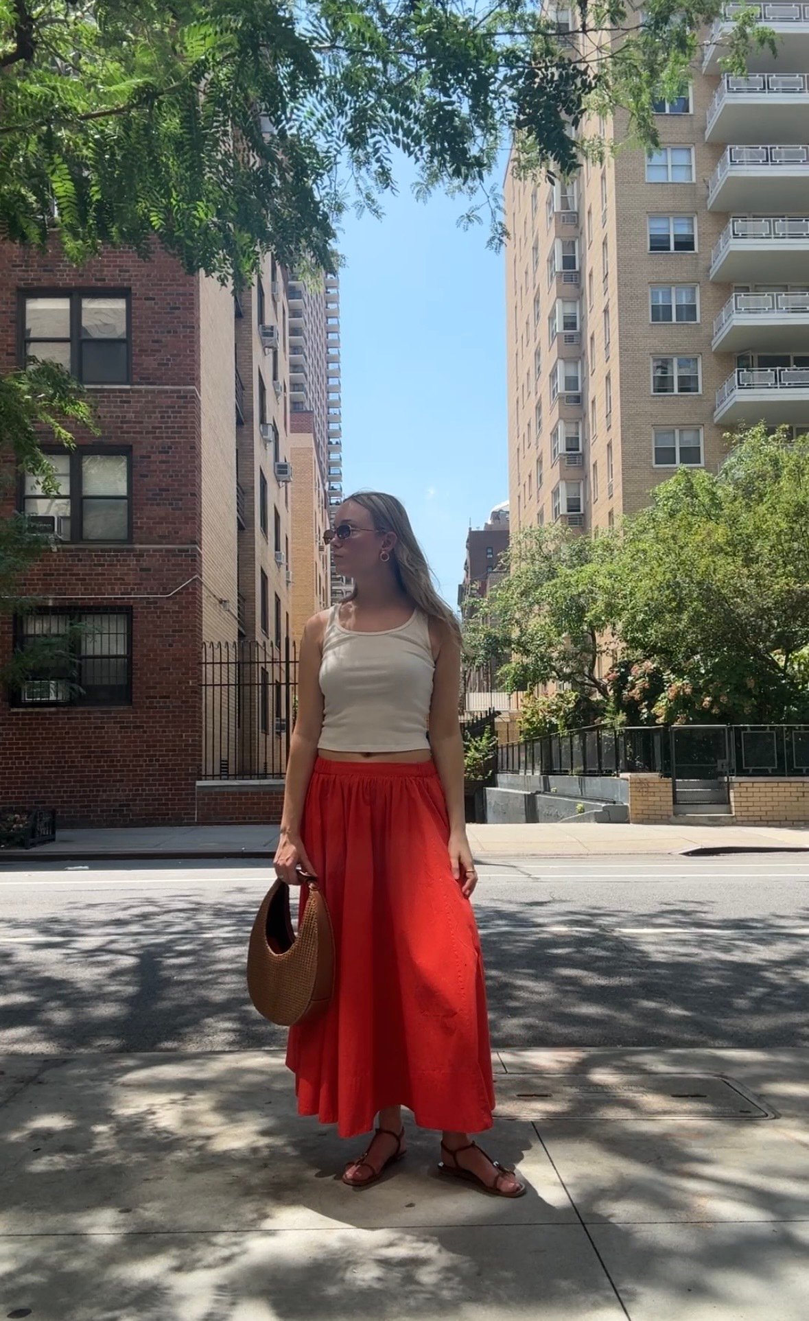 Fashion Director Michaela Bushkin wearing the Lowen Midi Skirt.