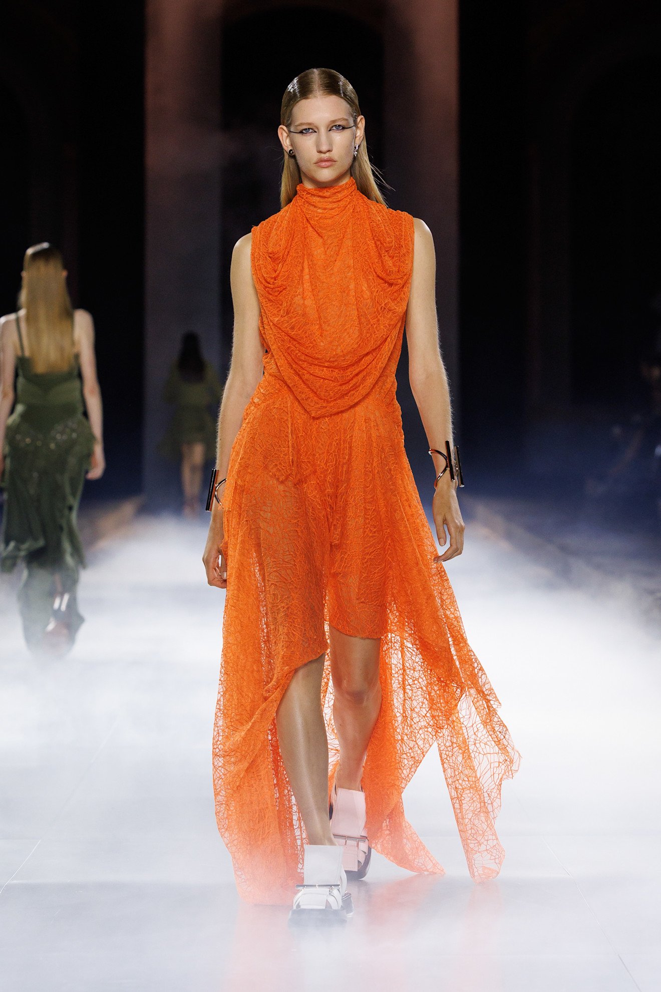 Photos from the Spring Summer 2026 runway showcasing orange color trend.