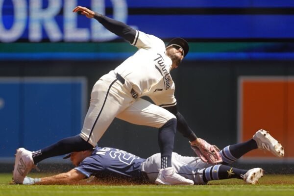 Rays score three in the 10th to beat Twins