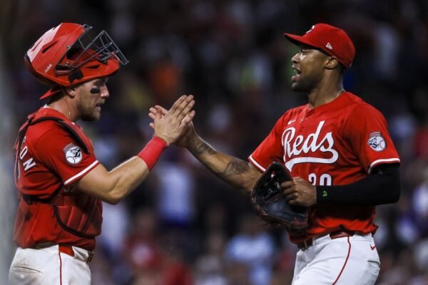 Reds, buyers at deadline, open series against selling Braves