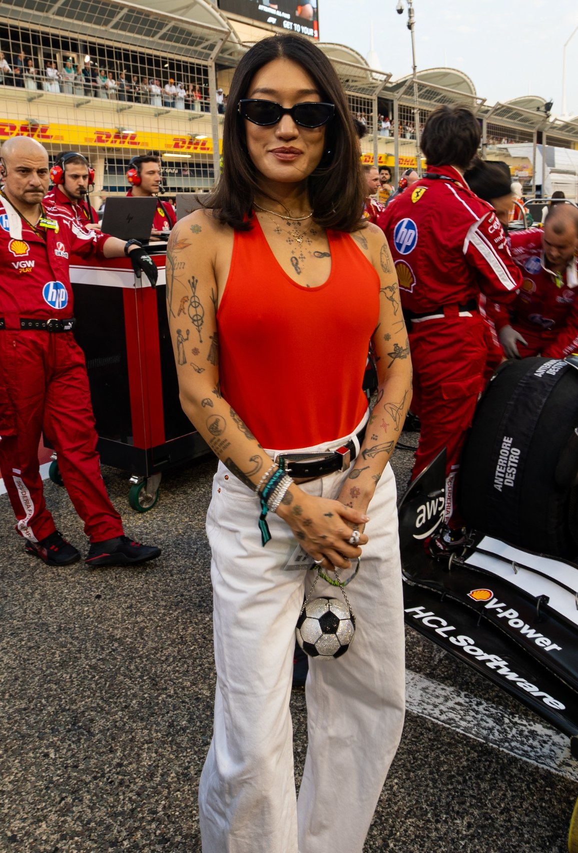 Peggy Gou poses with the Ferrari of Charles Leclerc of Monaco and Ferrari during the F1 Grand Prix of Bahrain at Bahrain International Circuit on April 13, 2025 in Bahrain, Bahrain. (Photo by Kym Illman/Getty Images)