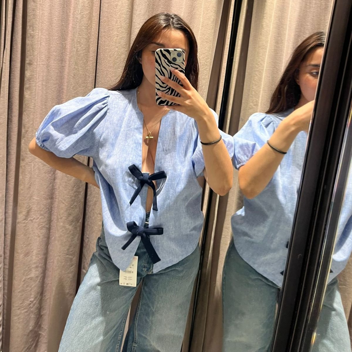 Marina Avraam Senior Shopping Editor wearing Zara blouse and jeans