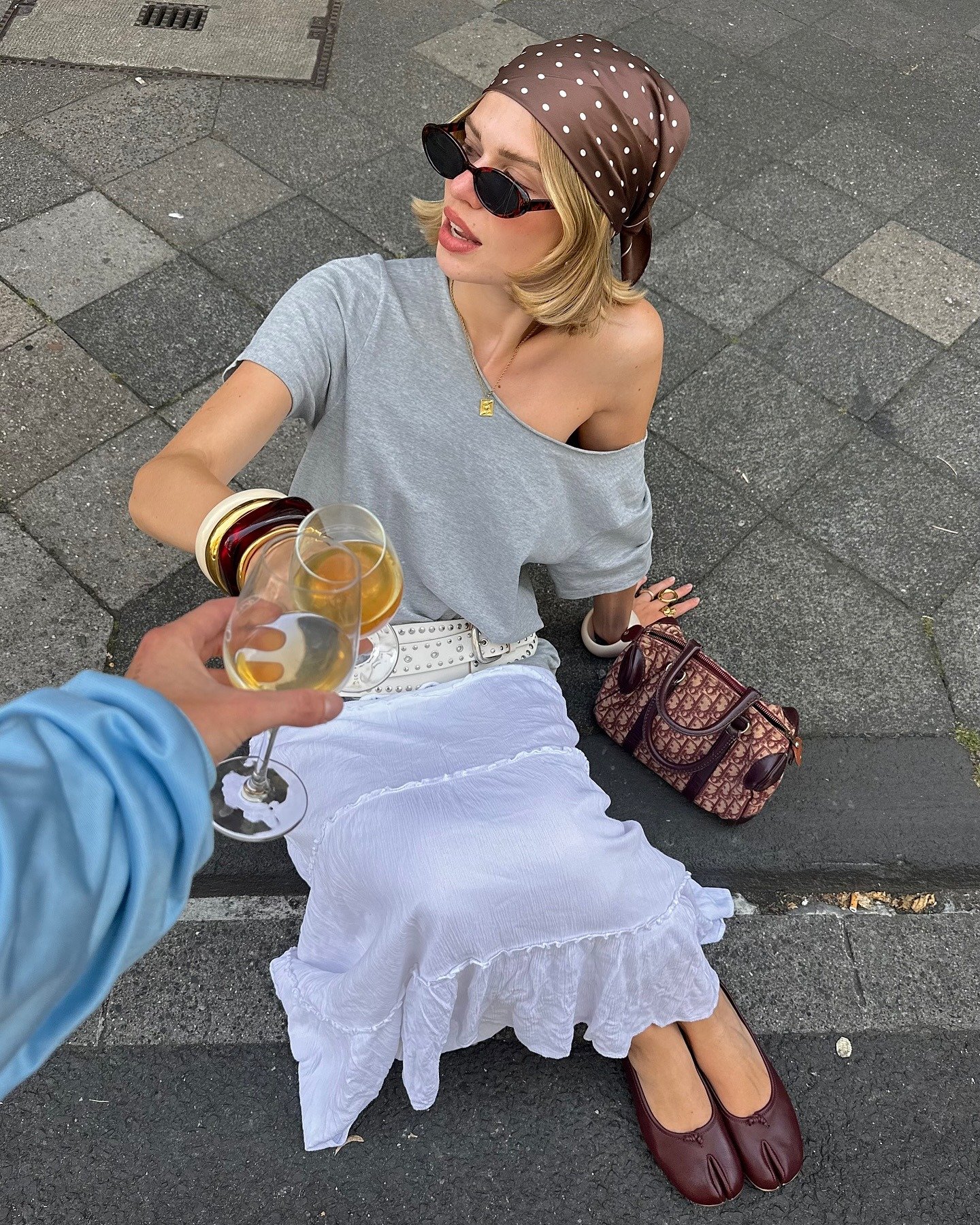 Fashion person Linda Sza wears the tiered white maxi skirt london girl trend