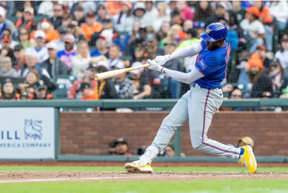 Jul 27, 2025; San Francisco, California, USA; New York Mets third baseman Ronny Mauricio (10) hits a solo home run during the seventh inning San Francisco Giants at Oracle Park. Mandatory Credit: Bob Kupbens-Imagn Images