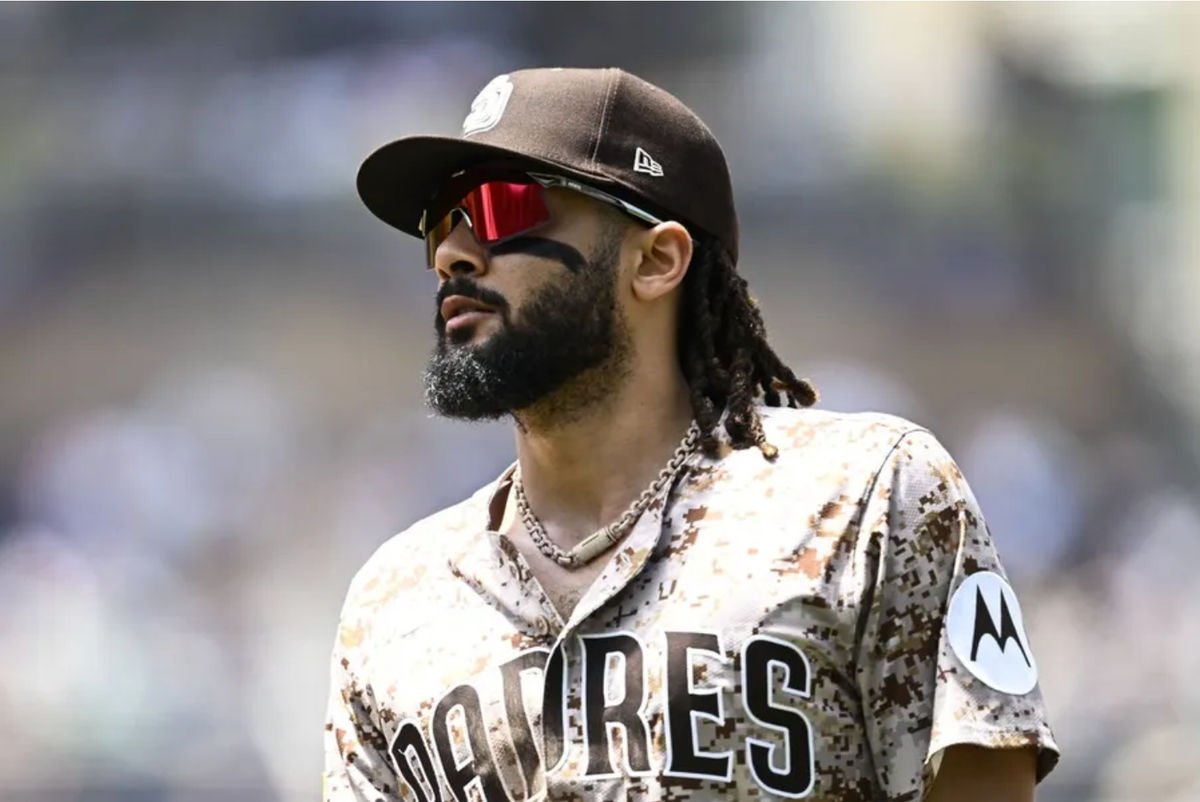 Jun 22, 2025; San Diego, California, USA; San Diego Padres outfielder Fernando Tatis Jr. (23) comes off the field during the third inning against the Kansas City Royals at Petco Park. Mandatory Credit: Denis Poroy-Imagn Images