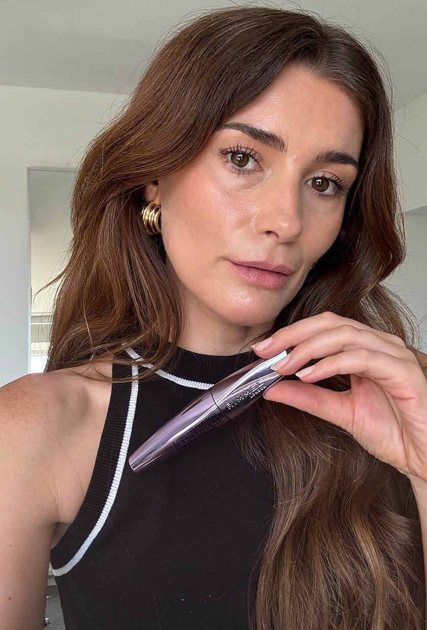 Beauty editor Eleanor Vousden holding the Rimmel Wonder'Bond Lash Filler + Hyaluronic Mascara