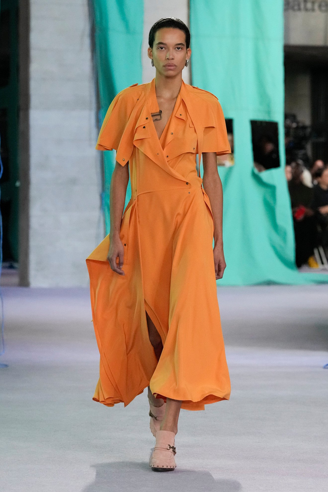 Photos from the Spring Summer 2026 runway showcasing orange color trend.