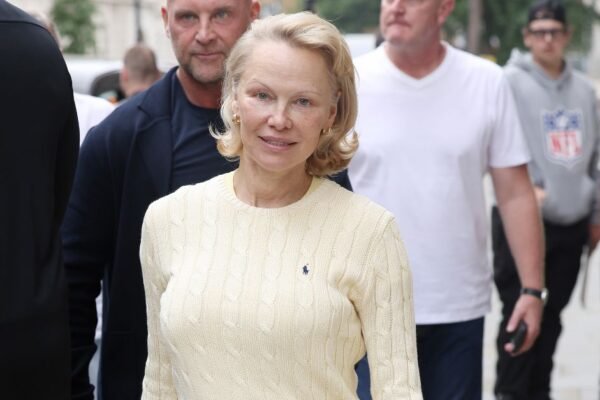 Pamela Anderson’s Yellow Skirt Made Her White Trainers Feel So Fresh