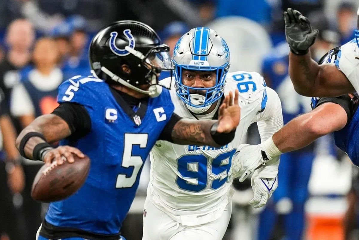 Detroit Lions defensive end Za'Darius Smith (99) pressures Indianapolis Colts quarterback Anthony Richardson (5) during the second half at Lucas Oil Stadium in Indianapolis, Ind. on Sunday, Nov. 24, 2024. PHOTO USA TODAY SPORTS IMAGES