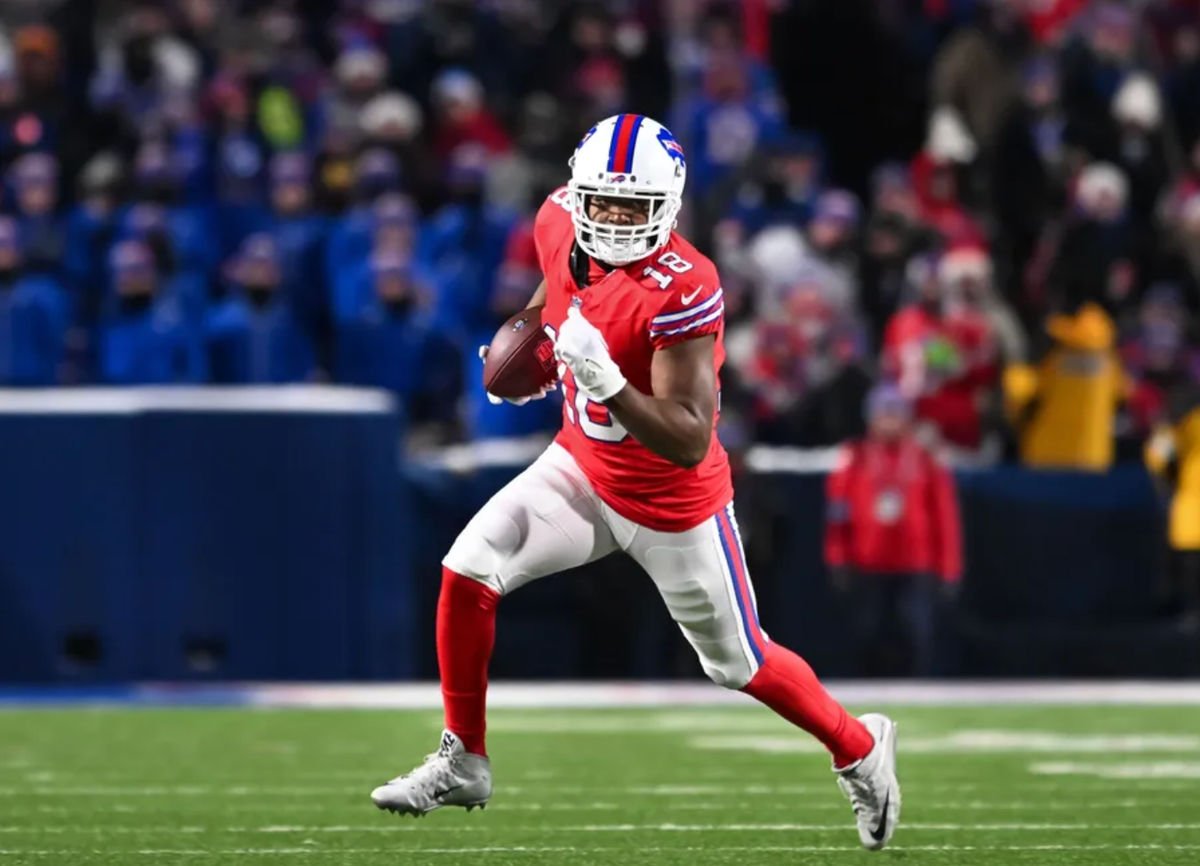 Dec 22, 2024; Orchard Park, New York, USA; Buffalo Bills wide receiver Amari Cooper (18) turns up field after making a catch in the second quarter against the New England Patriots at Highmark Stadium. Mandatory Credit: Mark Konezny-Imagn Images