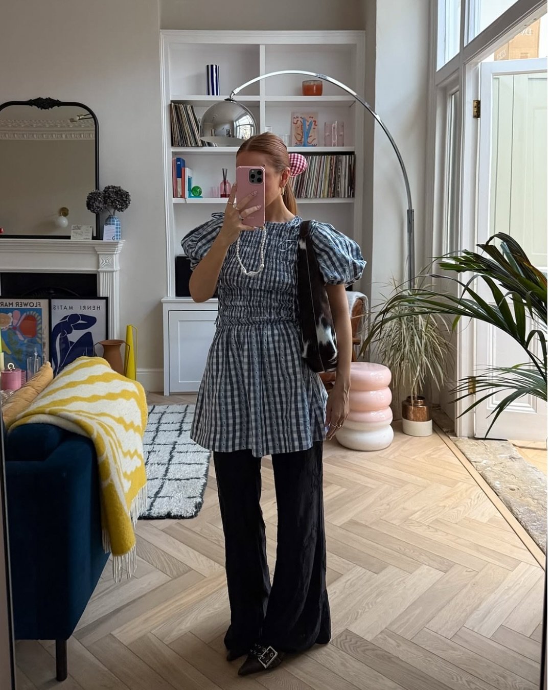 woman wearing Damson Madder dress over trousers