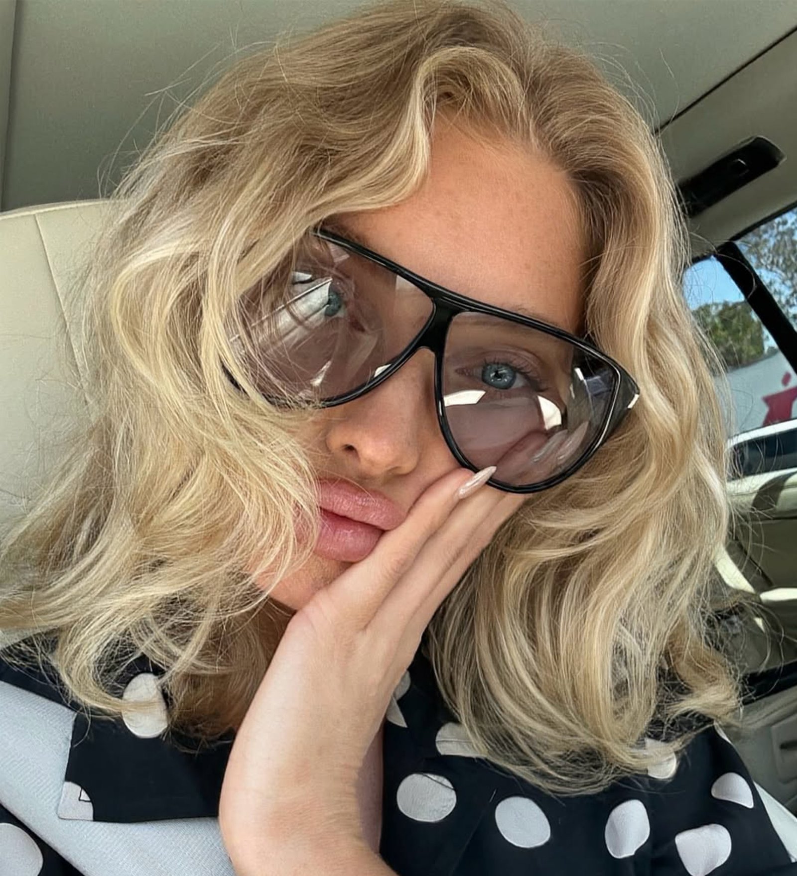 Elsa Hosk wears a baroque bob with windswept curls