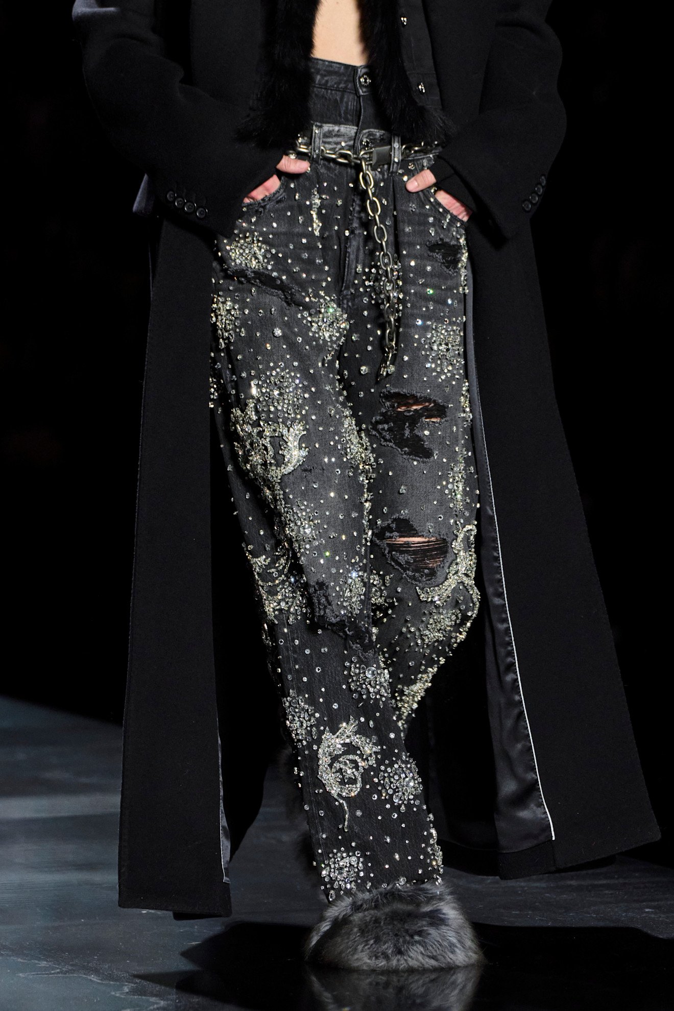 Model wears embellished jeans on the Dolce & Gabbana runway