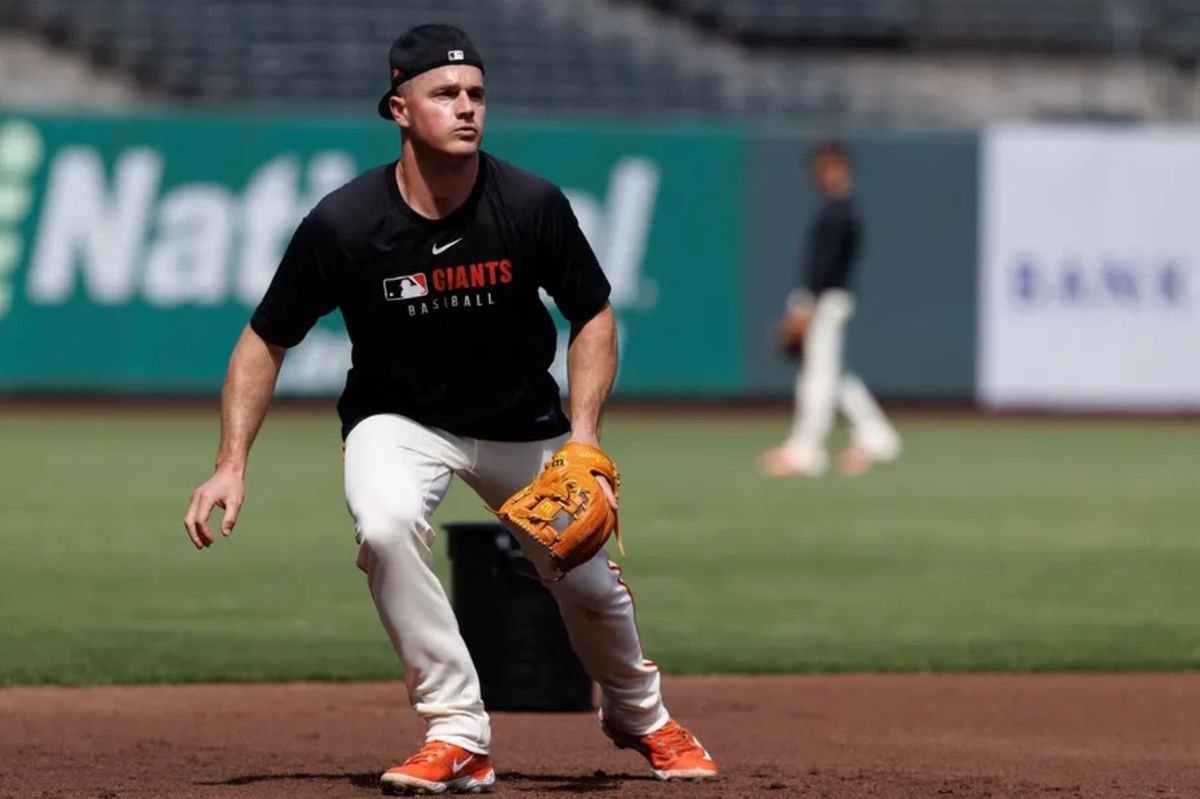 Jun 25, 2025; San Francisco, California, USA; San Francisco Giants third baseman Matt Chapman (26) fields grounders before the game against the Miami Marlins at Oracle Park. Mandatory Credit: Sergio Estrada-Imagn Images